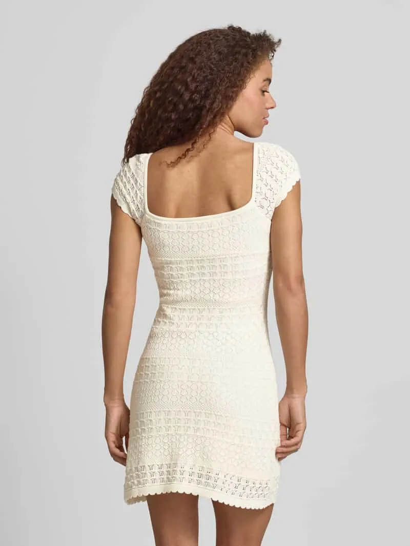 REVIEW Tricotjurk met structuurpatroon en golvende zoom offwhite, foto 4