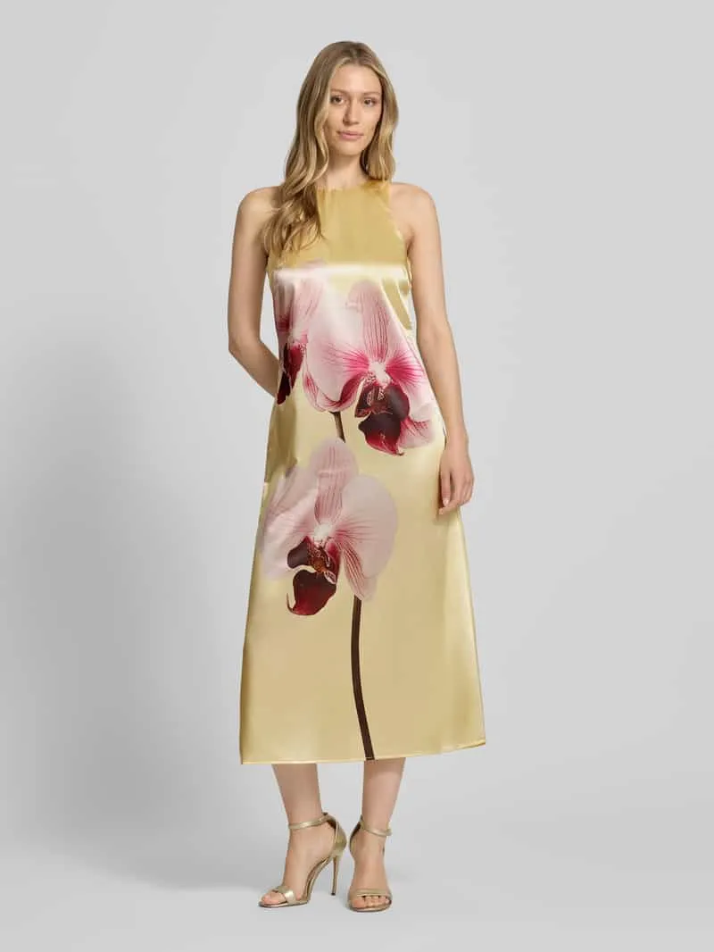 Yas cocktailjurk van satijn met motiefprint Geel