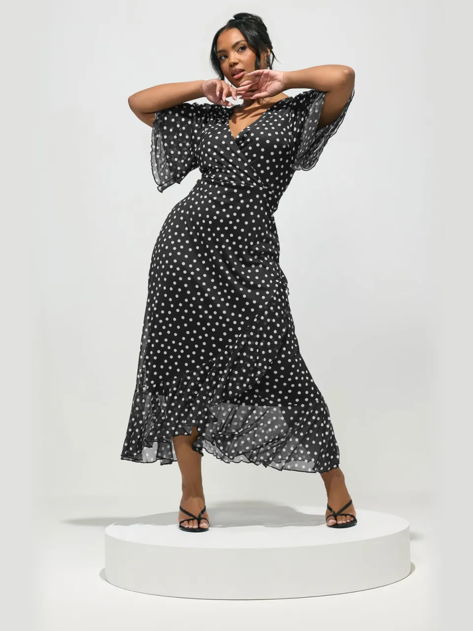 Yours London Zwarte Wikkeljurk Met Polkadots Size Petite > 52, foto 2