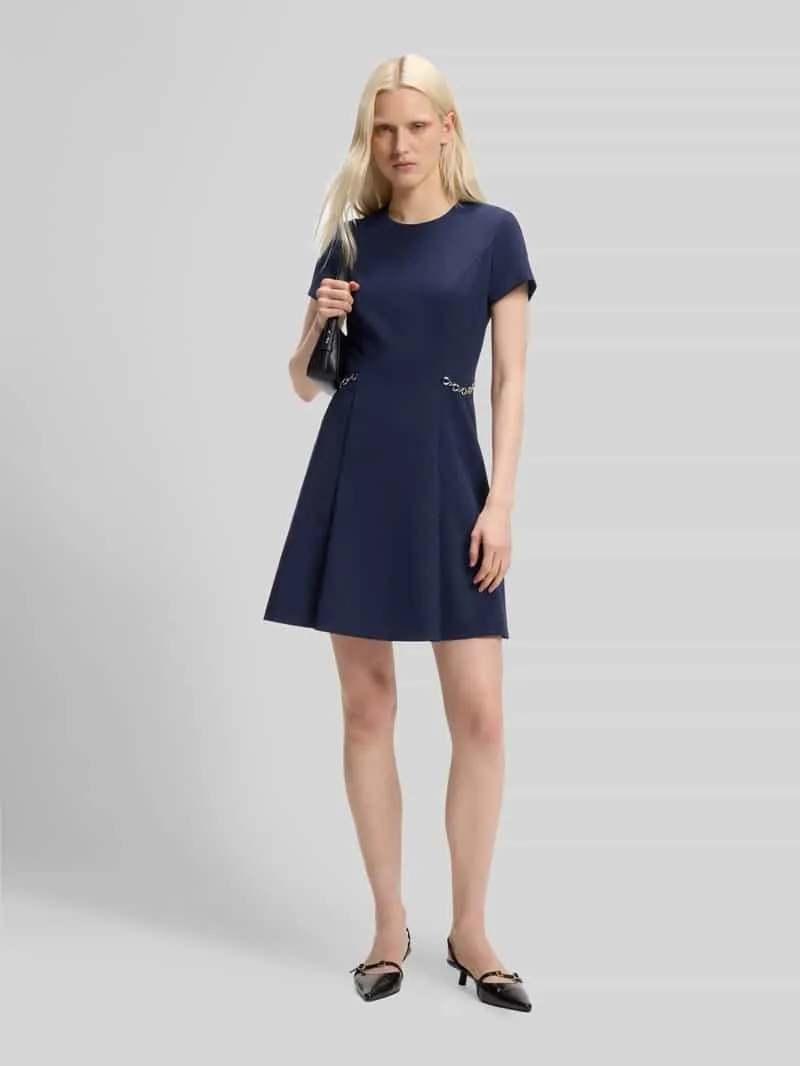 Hugo Kokerjurk met paillettendetails model 'KAELYN' Marineblauw