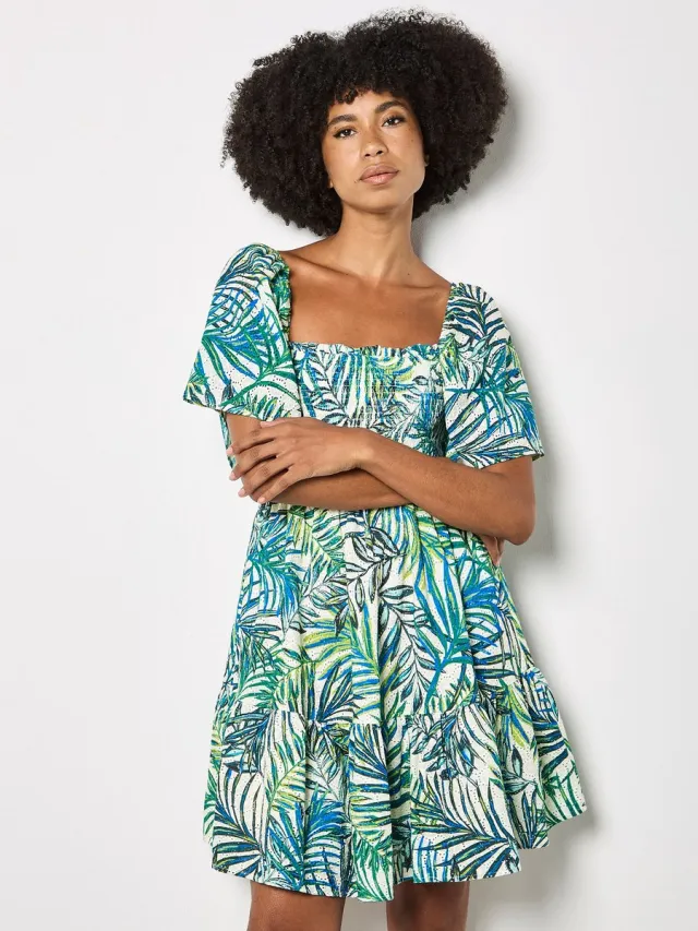 Apricot Mini-jurk met palmprint en gesmokt broderie-bovenstuk Wit