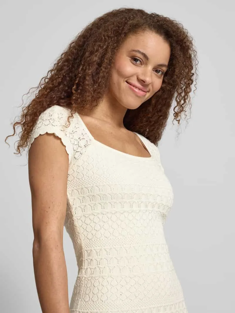 REVIEW Tricotjurk met structuurpatroon en golvende zoom offwhite, foto 5