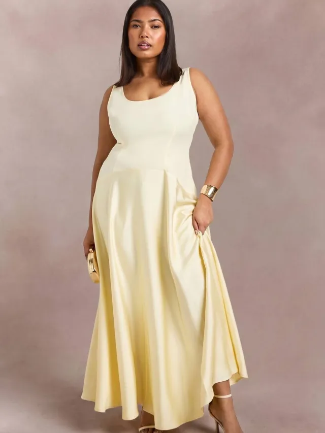 boohoo Dames Plus Crêpe Mouwloze Jurk Met Satijnen Rok Citroen