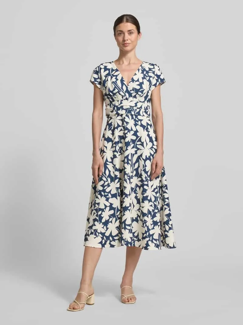 Swing Cocktailjurk met v-hals en tailleband Marineblauw