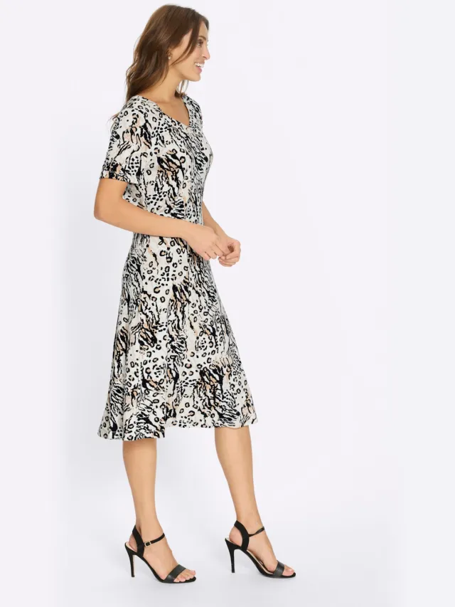 Jersey jurk ecru/zwart geprint