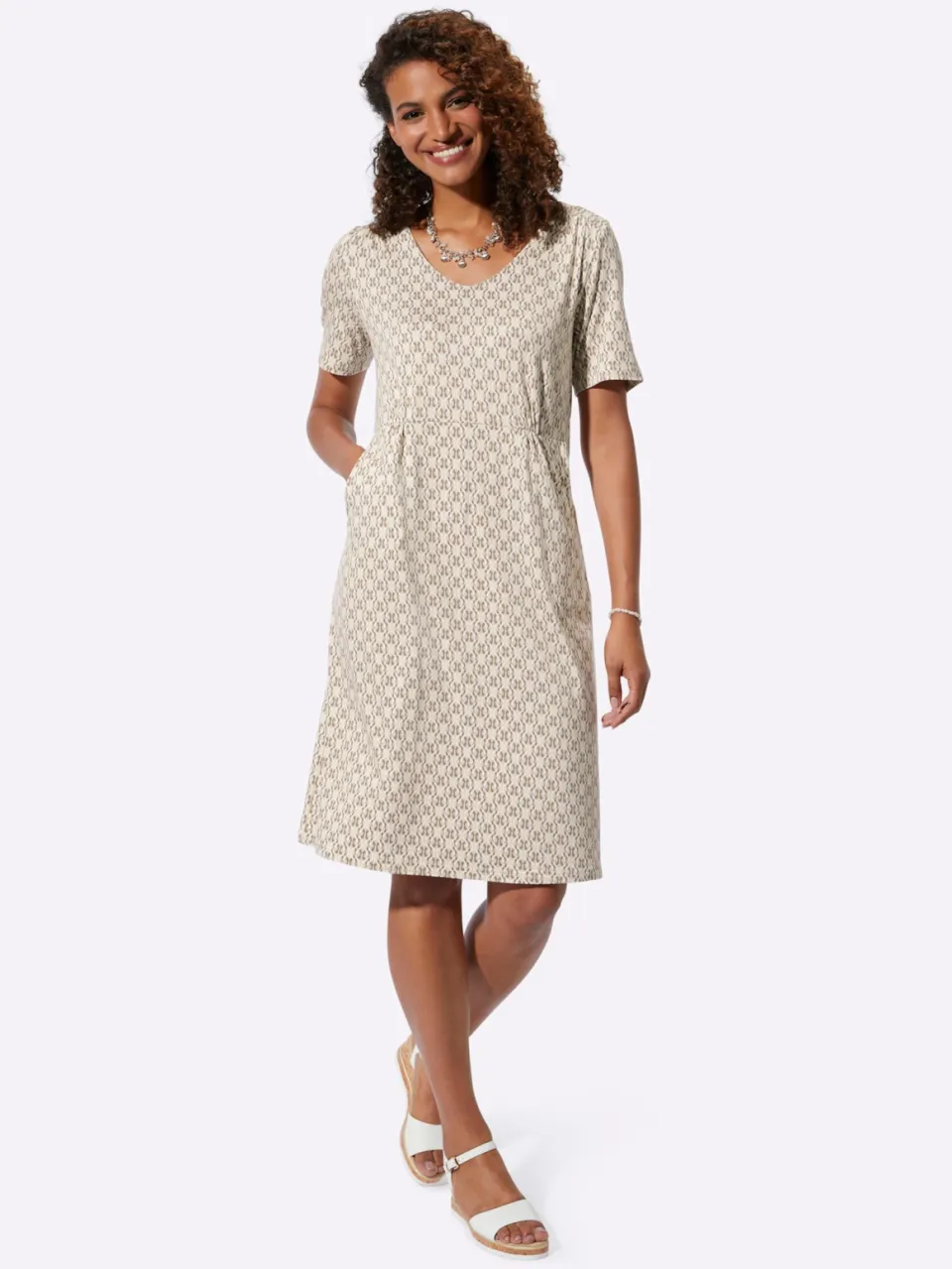 Jersey jurk zand/donkertaupe bedrukt
