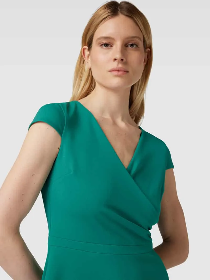 Paradi Cocktailjurk in effen design groen, foto 4
