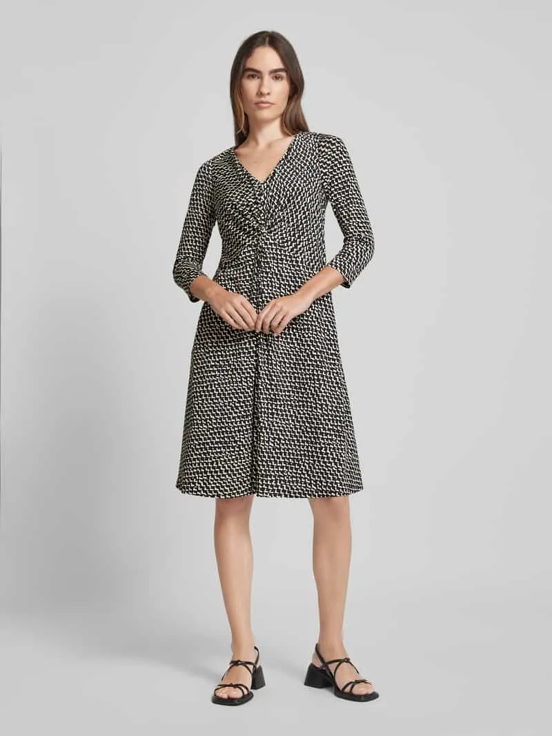 Vera Mont Knielange cocktailjurk met V-hals Zwart