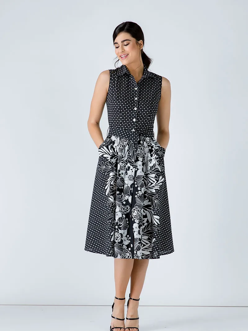 Conquista Zwarte jurk met knoopdetail en print