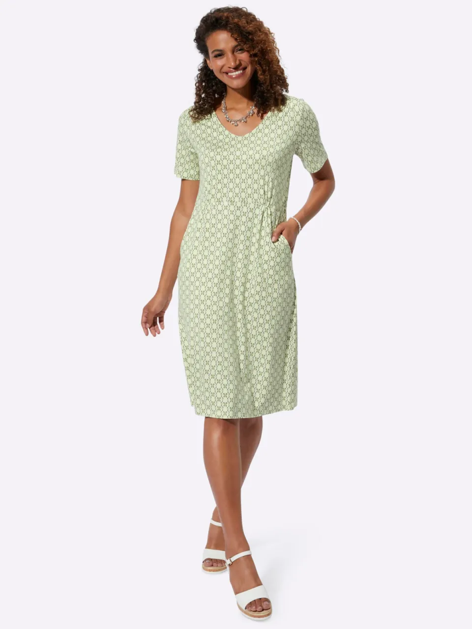 Jersey jurk pistache/kaki bedrukt